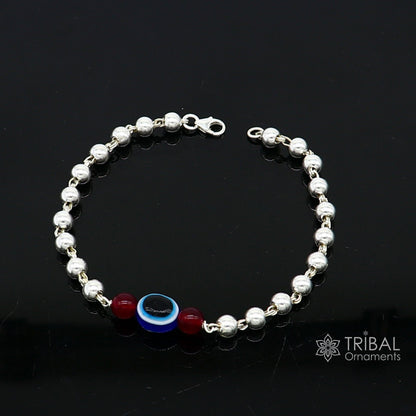 Unisex 925 sterling silver handmade beaded evil eye bracelet from TRIBAL ORNAMENTS, featuring cultural, trendy silver jewelry design.