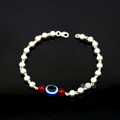 Unisex 925 sterling silver handmade beaded evil eye bracelet by TRIBAL ORNAMENTS, featuring cultural and trendy silver jewelry design.