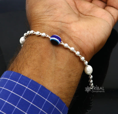 Unisex 925 sterling silver handmade evil eye beaded bracelet with tribal design, stylish and cultural jewelry by TRIBAL ORNAMENTS.