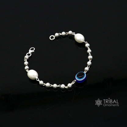 Handmade 925 sterling silver beaded evil eye bracelet by TRIBAL ORNAMENTS, unisex trendy jewelry with cultural design and all sizes available.