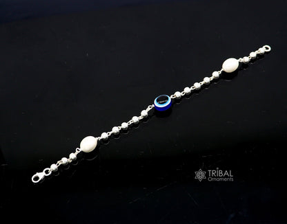 Unisex 925 sterling silver handmade beaded evil eye bracelet with cultural tribal design and trendy style.