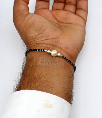 925 sterling silver cultural black beaded bracelet or anklet combo, featuring traditional design and adjustable sizes by TRIBAL ORNAMENTS.