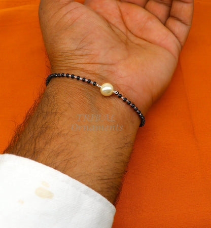 Tribal Ornaments 925 sterling silver black beaded girls bracelet and anklet combo, with modern cultural design and adjustable sizes.