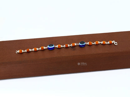 Unisex handmade bracelet with 925 sterling silver Rudraksha beads and evil eye charm, stylish tribal jewelry.
