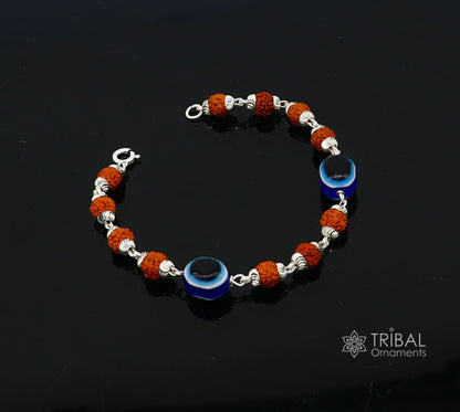 Sterling silver Rudraksha beads and evil eye bracelet, unisex handmade jewelry by TRIBAL ORNAMENTS, stylish tribal accessory.
