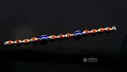 Stylish unisex handmade bracelet with 925 sterling silver Rudraksha beads and evil eye charm, cultural and trendy jewelry piece.