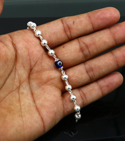 925 sterling silver beaded evil eye bracelet by Tribal Ornaments, stylish unisex kids jewelry with colorful beads and protective evil eye charm.