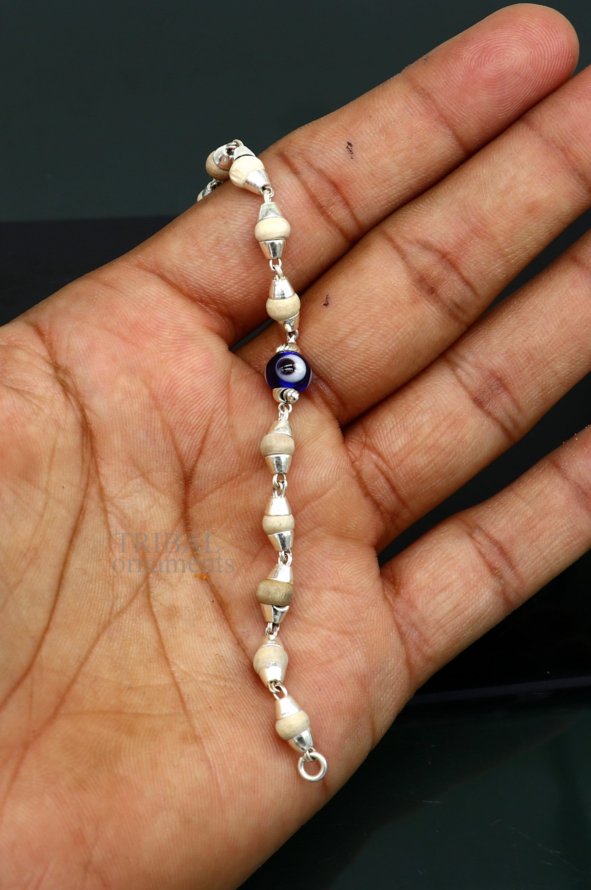 Sterling silver handmade baby Tulsi bracelet with evil eye beads, stylish unisex jewelry by Tribal Ornaments.