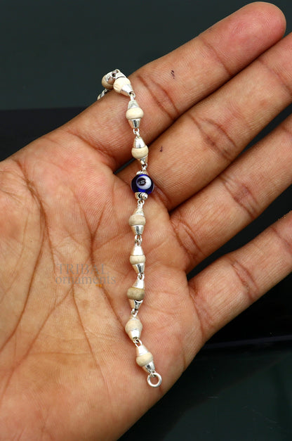 Sterling silver handmade baby Tulsi bracelet with evil eye beads, stylish unisex jewelry by Tribal Ornaments.
