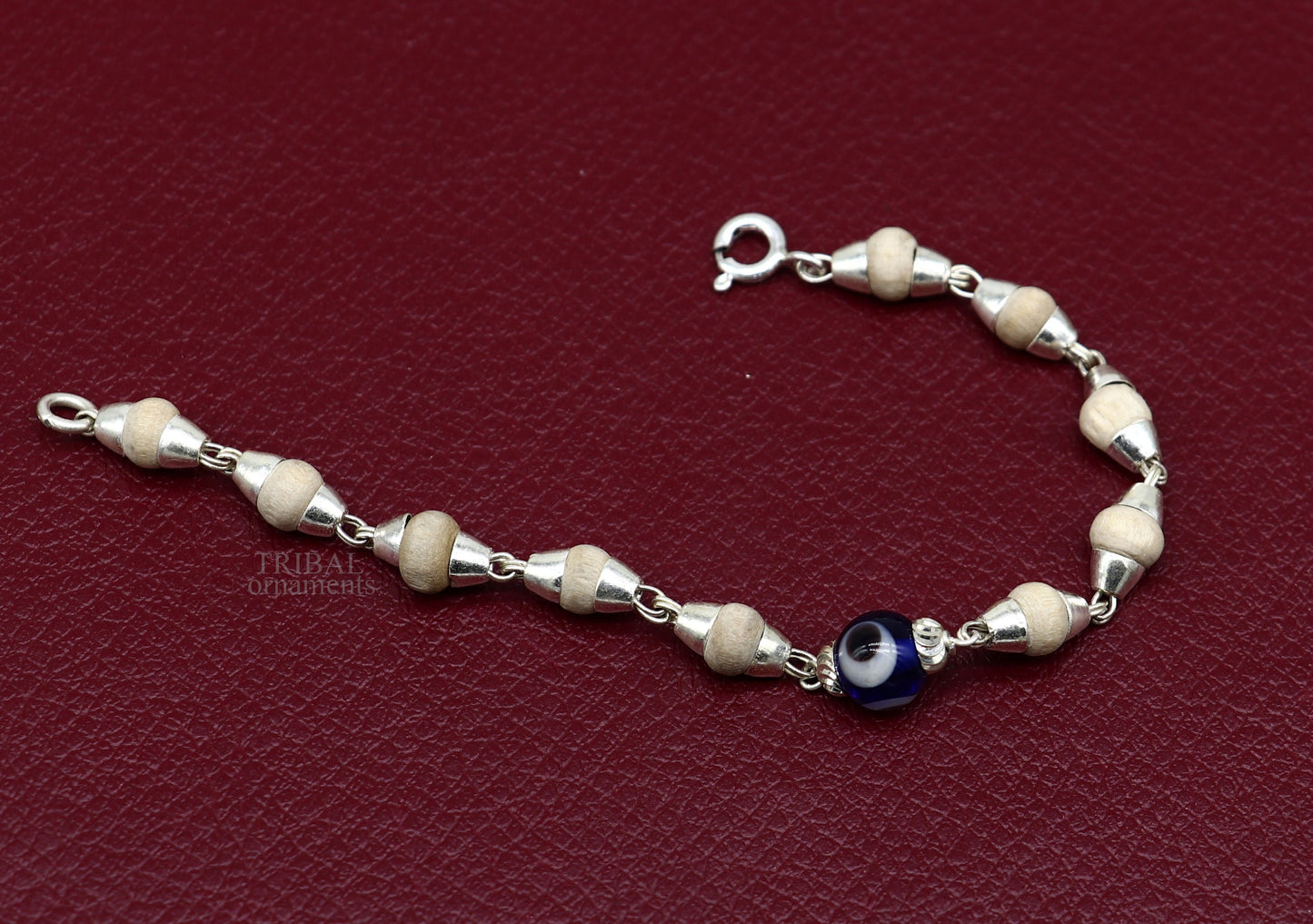 Sterling silver handmade baby Tulsi bracelet with evil eye beads, stylish unisex jewelry by TRIBAL ORNAMENTS, 5-inch size.