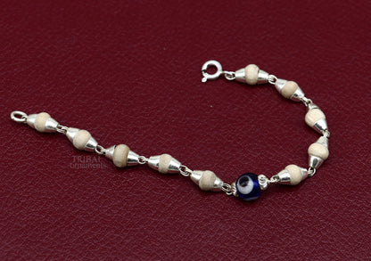 Sterling silver handmade baby Tulsi bracelet with evil eye beads, stylish unisex jewelry by TRIBAL ORNAMENTS, 5-inch size.