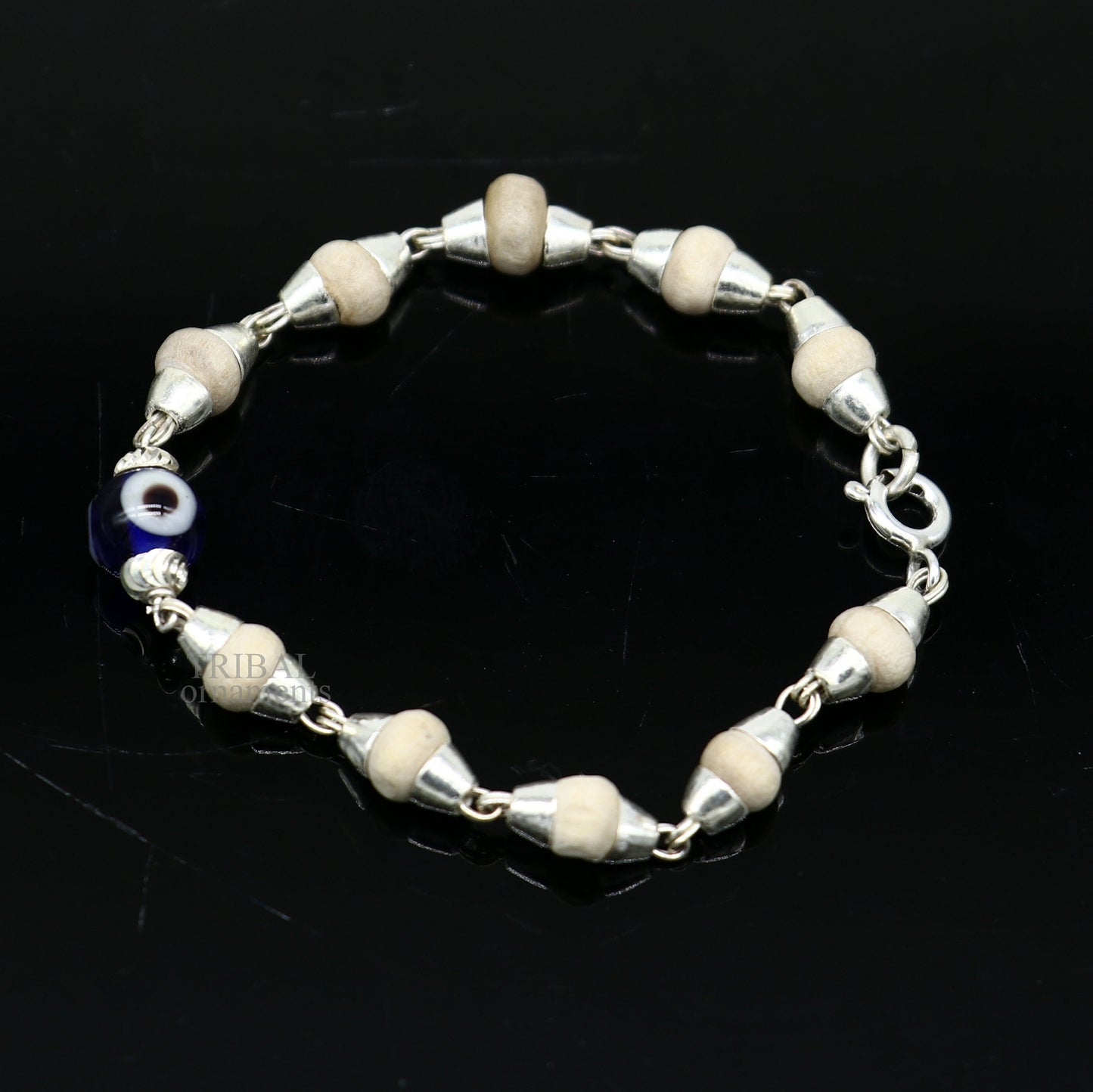 Stylish 925 sterling silver handmade baby Tulsi bracelet with evil eye beads, unisex design by TRIBAL ORNAMENTS.