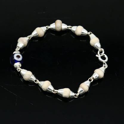 Stylish 925 sterling silver handmade baby Tulsi bracelet with evil eye beads, unisex design by TRIBAL ORNAMENTS.