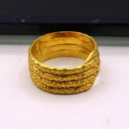 Vintage 22KT yellow gold handmade traditional ring band from TRIBAL ORNAMENTS, featuring tribal unisex design without stones.