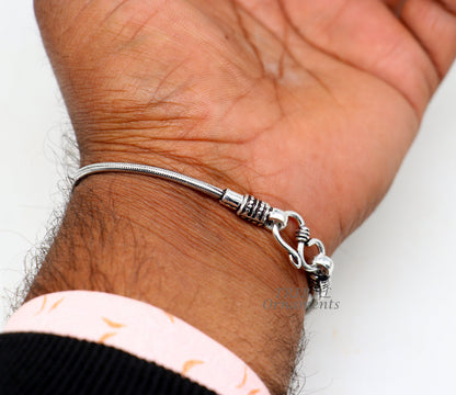Sterling silver 2mm snake chain bracelet by Tribal Ornaments, flexible unisex vintage jewelry with intricate craftsmanship from Rajasthan.