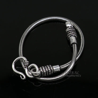 Sterling silver 2mm snake chain bracelet by Tribal Ornaments, flexible vintage-style unisex jewelry from Rajasthan, India.