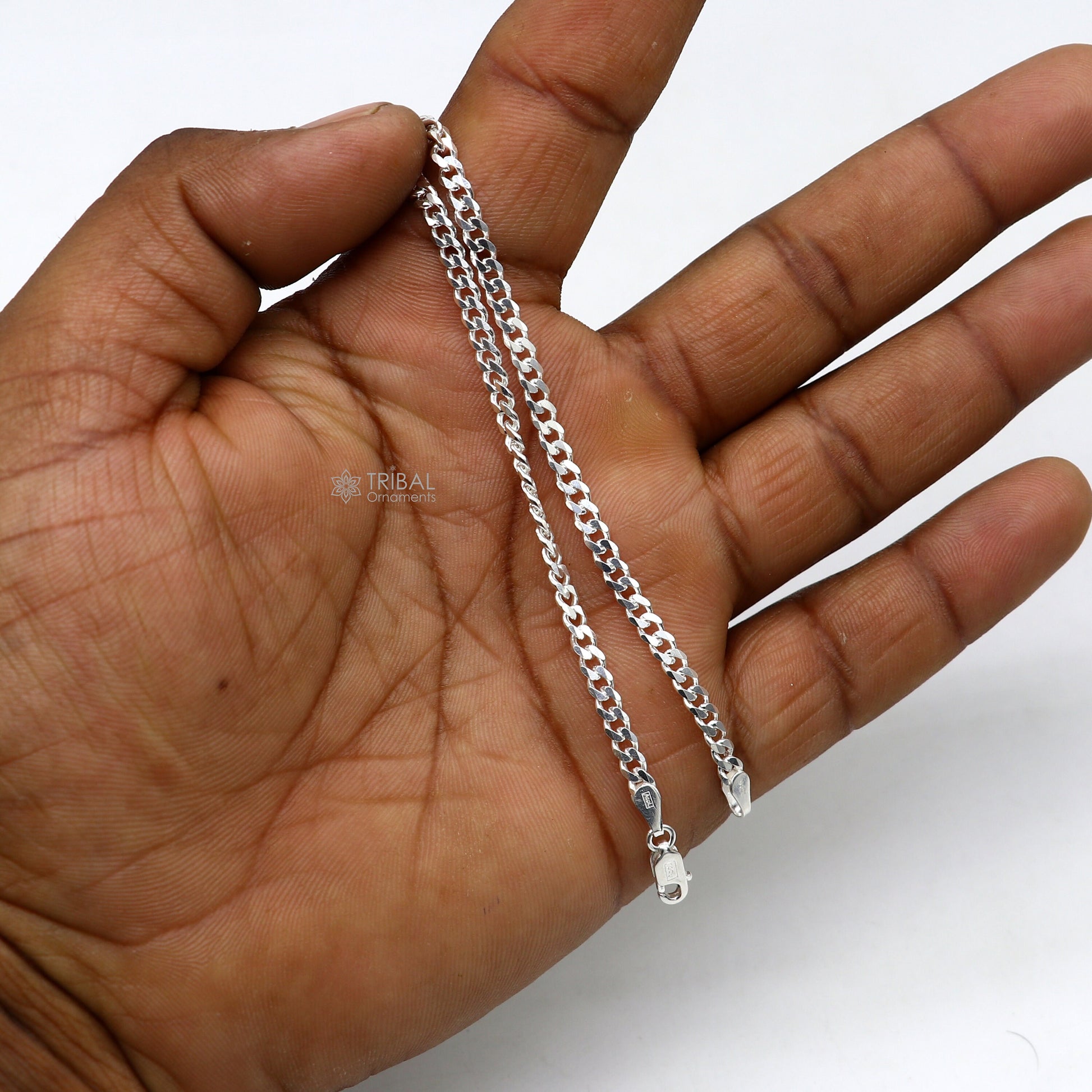 Sterling silver 3mm flat chain bracelet by Tribal Ornaments, unisex flexible jewelry with a sleek, minimalist design.
