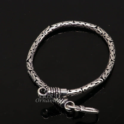 Sterling silver Byzantine chain bracelet by TRIBAL ORNAMENTS, unisex, handmade, flexible jewelry with intricate design and craftsmanship.