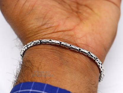 Sterling silver Byzantine chain bracelet by TRIBAL ORNAMENTS, flexible unisex jewelry with intricate handmade design.
