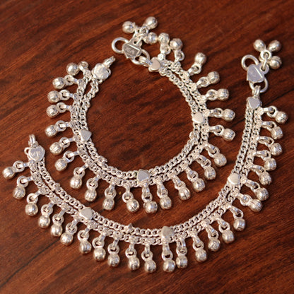 Sterling silver vintage-style baby ankle bracelet with jingle bells, handmade tribal jewelry for infants and young children.