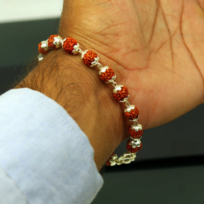 Handmade Rudraksha beads bracelet by TRIBAL ORNAMENTS, unisex jewelry from India with personalized customization.