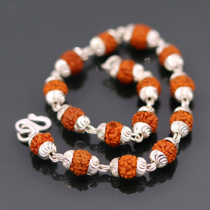 Solid silver Rudraksha beads bracelet from Rajasthan, handmade unisex jewelry by TRIBAL ORNAMENTS featuring 6mm natural beads.