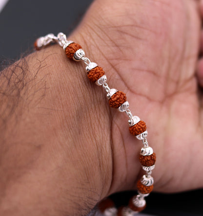Solid silver Rudraksha beads bracelet by TRIBAL ORNAMENTS featuring 6mm natural Rudraksha beads for unisex jewelry.