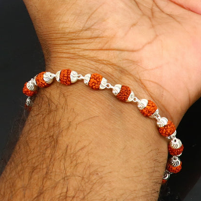 Solid silver handmade Rudraksha beads bracelet featuring 6mm natural Rudraksha for divine jewelry from Rajasthan, India.