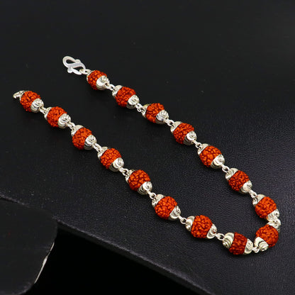 Solid silver handmade 6mm Rudraksha beads bracelet from TRIBAL ORNAMENTS, showcasing natural beads and intricate craftsmanship.