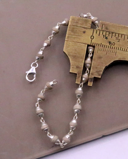 Sterling silver handmade basil rosary beads and tulsi plant wood beads bracelet for unisex jewelry, crafted by Tribal Ornaments.