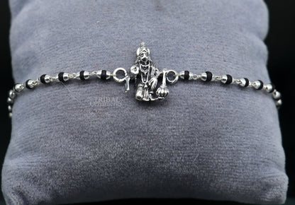 Sterling silver Hanuman design beaded bracelet with black Tulsi beads, personalized and crafted by TRIBAL ORNAMENTS.