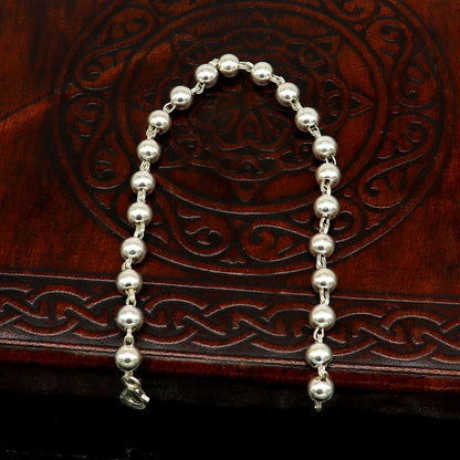 925 sterling silver handmade unisex beaded bracelet with 5.5 mm round beads, stylish and customizable jewelry by Tribal Ornaments.
