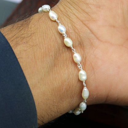 Sterling silver customized beaded bracelet with natural pearl, unisex jewelry by TRIBAL ORNAMENTS featuring handmade design.