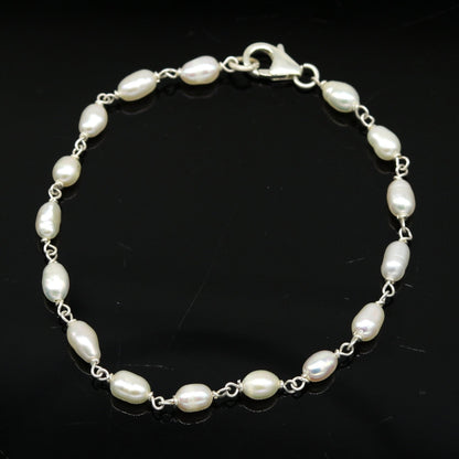 Tribal Ornaments 925 sterling silver beaded bracelet with natural pearl, unisex handcrafted jewelry for gifting or stylish wear.
