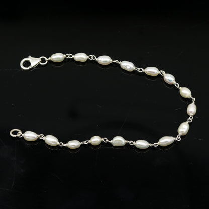 Sterling silver customized beaded bracelet with natural pearl, unisex jewelry by Tribal Ornaments, perfect for gifting or everyday wear.