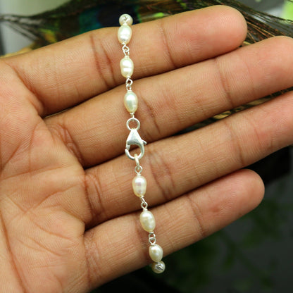 Sterling silver beaded bracelet with natural pearl accents, unisex handmade jewelry by TRIBAL ORNAMENTS, ideal for gifting.