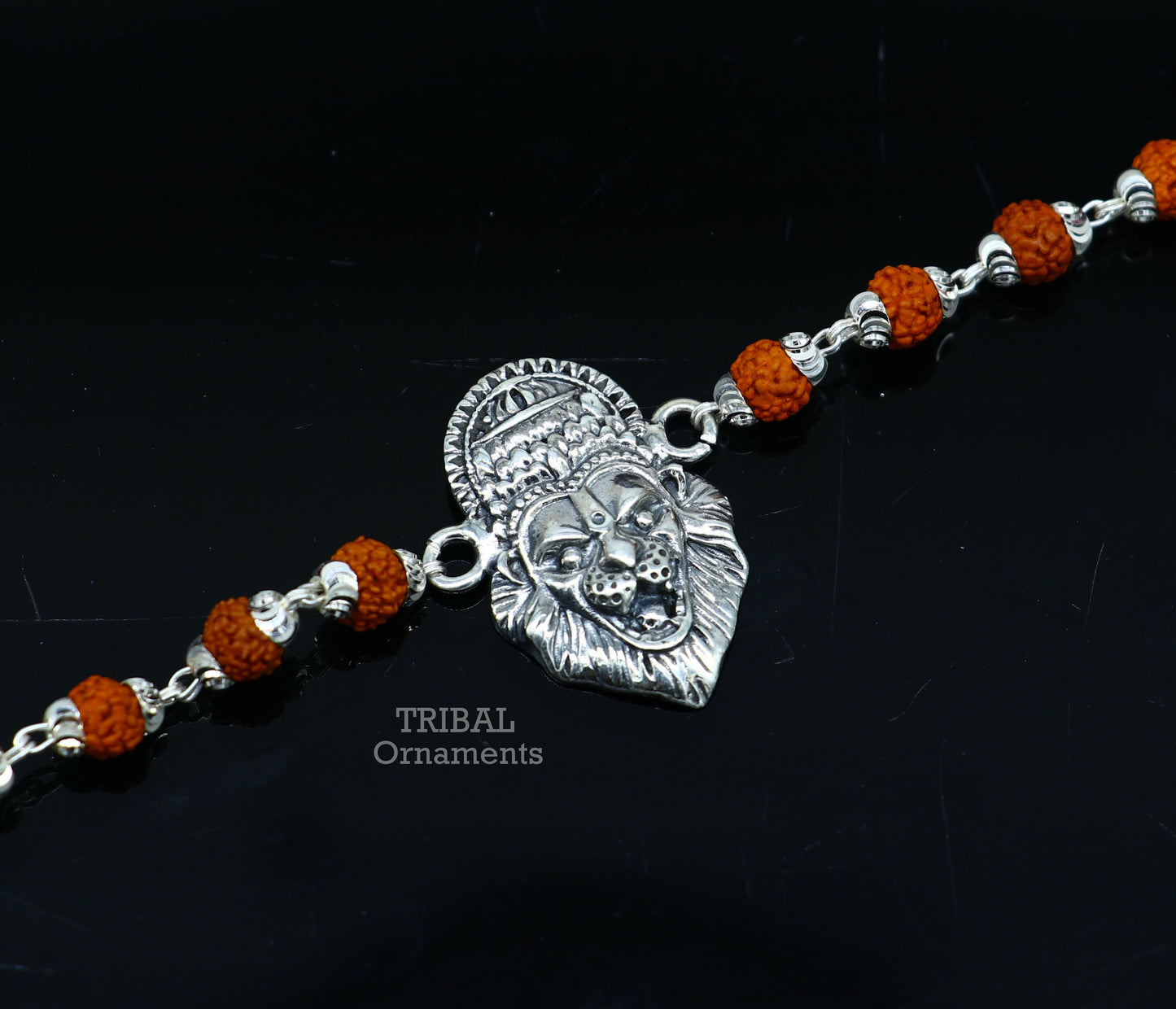 925 sterling silver Lord Narsimha design Rudraksha beaded bracelet with intricate handmade details by Tribal Ornaments.