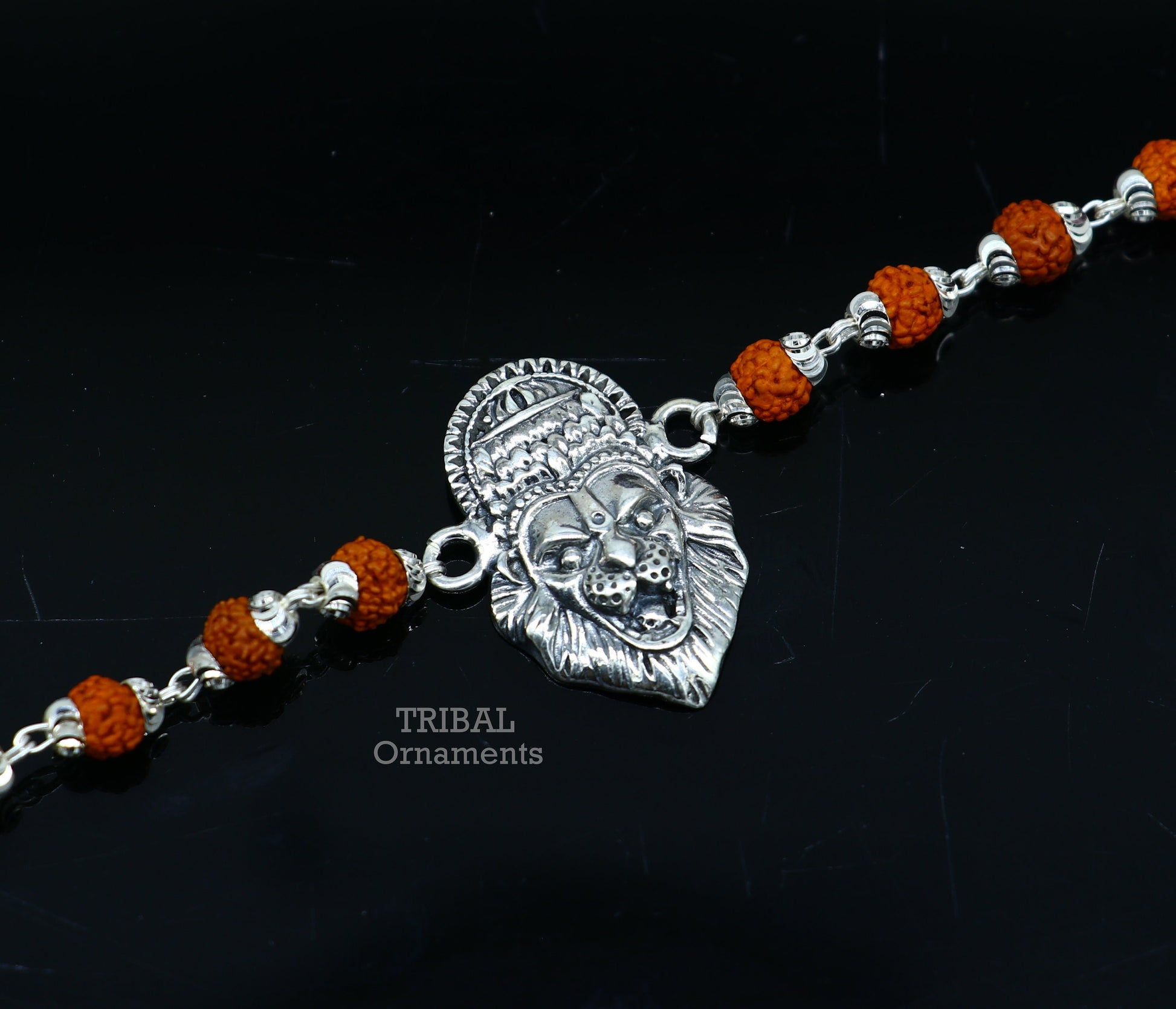 925 sterling silver Lord Narsimha design Rudraksha beaded bracelet with intricate handmade details by Tribal Ornaments.