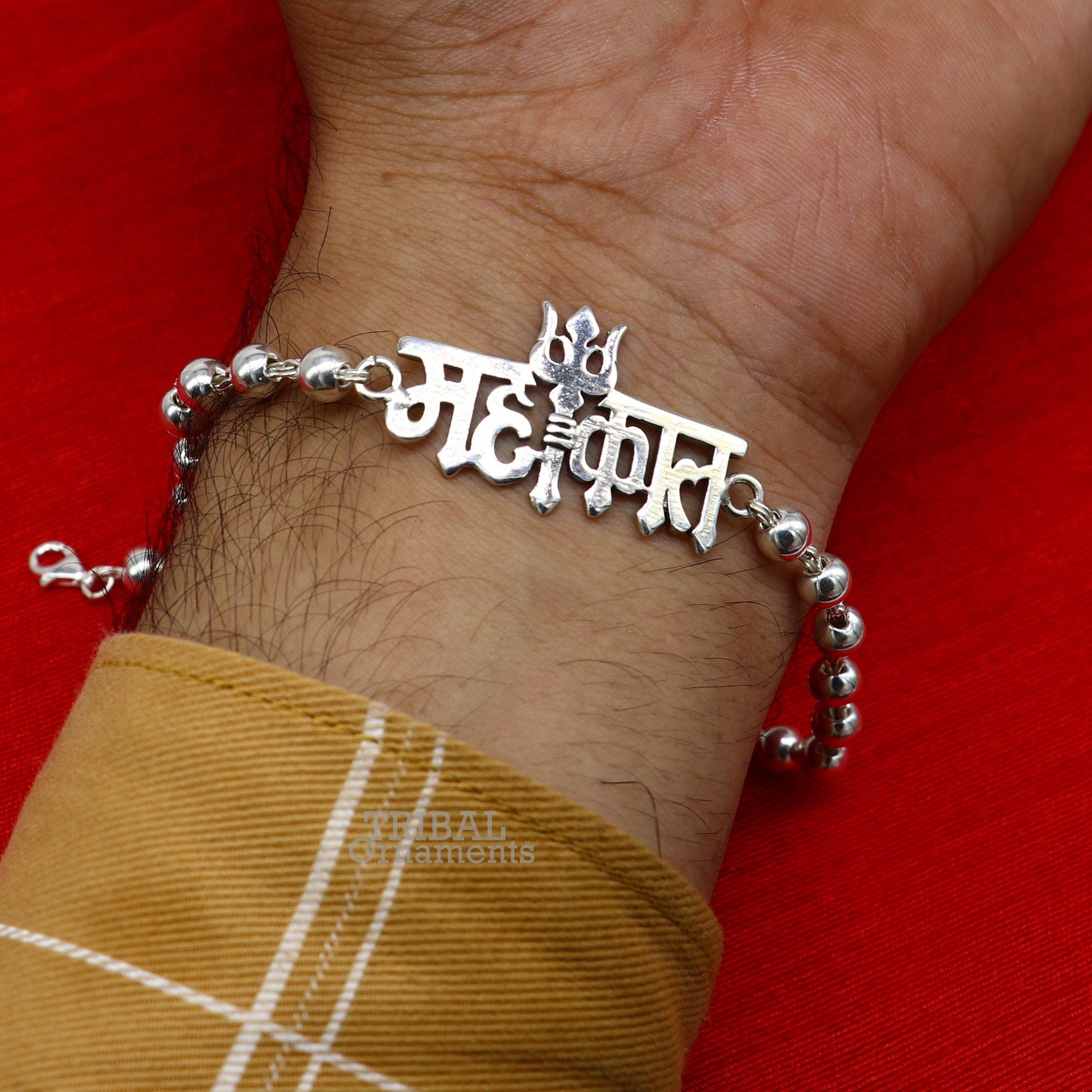 Sterling silver Lord Shiva Mahakal design beads bracelet by TRIBAL ORNAMENTS with intricate silver bead details.