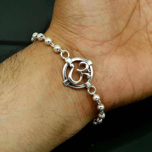 925 sterling silver OM beaded bracelet with tribal design, featuring personalized AUM symbol for traditional gift or jewelry.