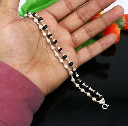 Black and white holy basil (tulsi) rosary plant beaded sterling silver bracelet, handmade Indian jewelry with two-line design.