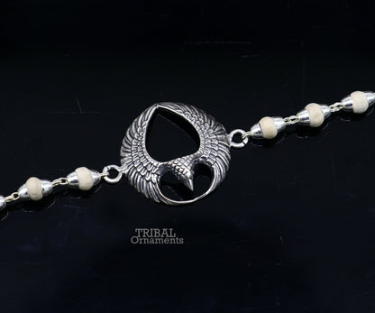 925 sterling silver Lord Garuda tulsi beaded bracelet rakhi with Basil design from TRIBAL ORNAMENTS, featuring black basil beads.
