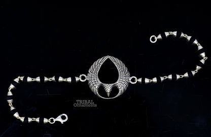 925 sterling silver Lord Garuda design Tulsi beaded bracelet rakhi by TRIBAL ORNAMENTS with black basil beads and intricate silver details.