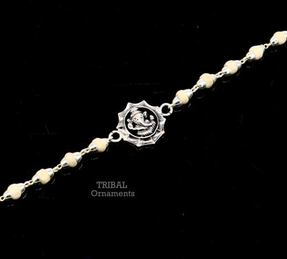 925 sterling silver Lord Ganesha design Tulsi beads bracelet rakhi with black basil and handmade detailing by Tribal Ornaments.