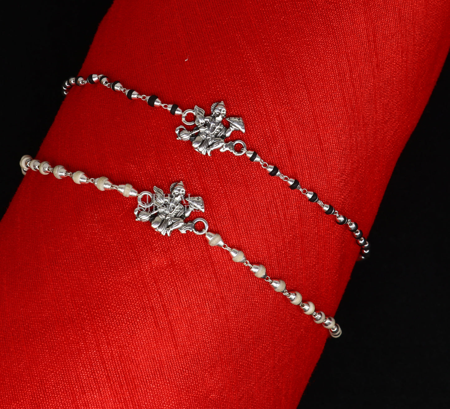 Handmade Lord Hanuman holy basil rosary beads bracelet with 925 sterling silver beads, featuring black Tulsi beads and intricate craftsmanship.