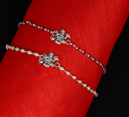 925 sterling silver Hanuman Tulsi beaded bracelet rakhi with black basil beads and Lord Hanuman motifs, handmade by Tribal Ornaments.
