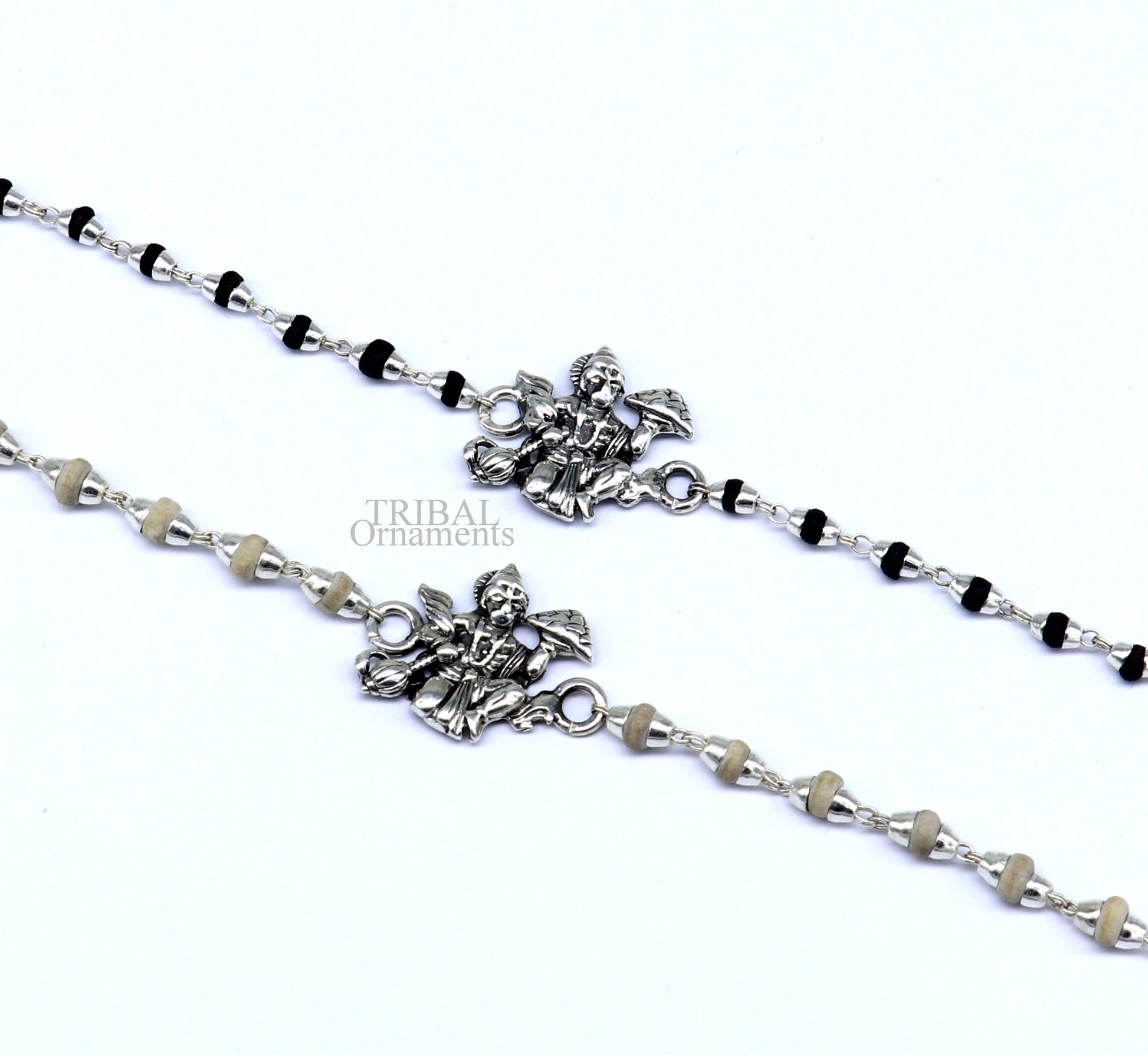 Handmade Lord Hanuman holy basil rosary beads bracelet with 925 sterling silver beads, featuring black tulsi beads for spiritual significance.