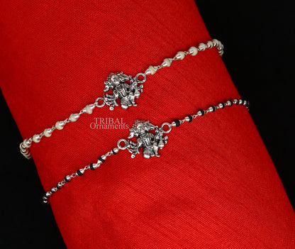 Sterling silver Panchmukhi Hanuman bracelet with Tulsi beads, handmade Rakhi with black basil and holy basil rosary beads.