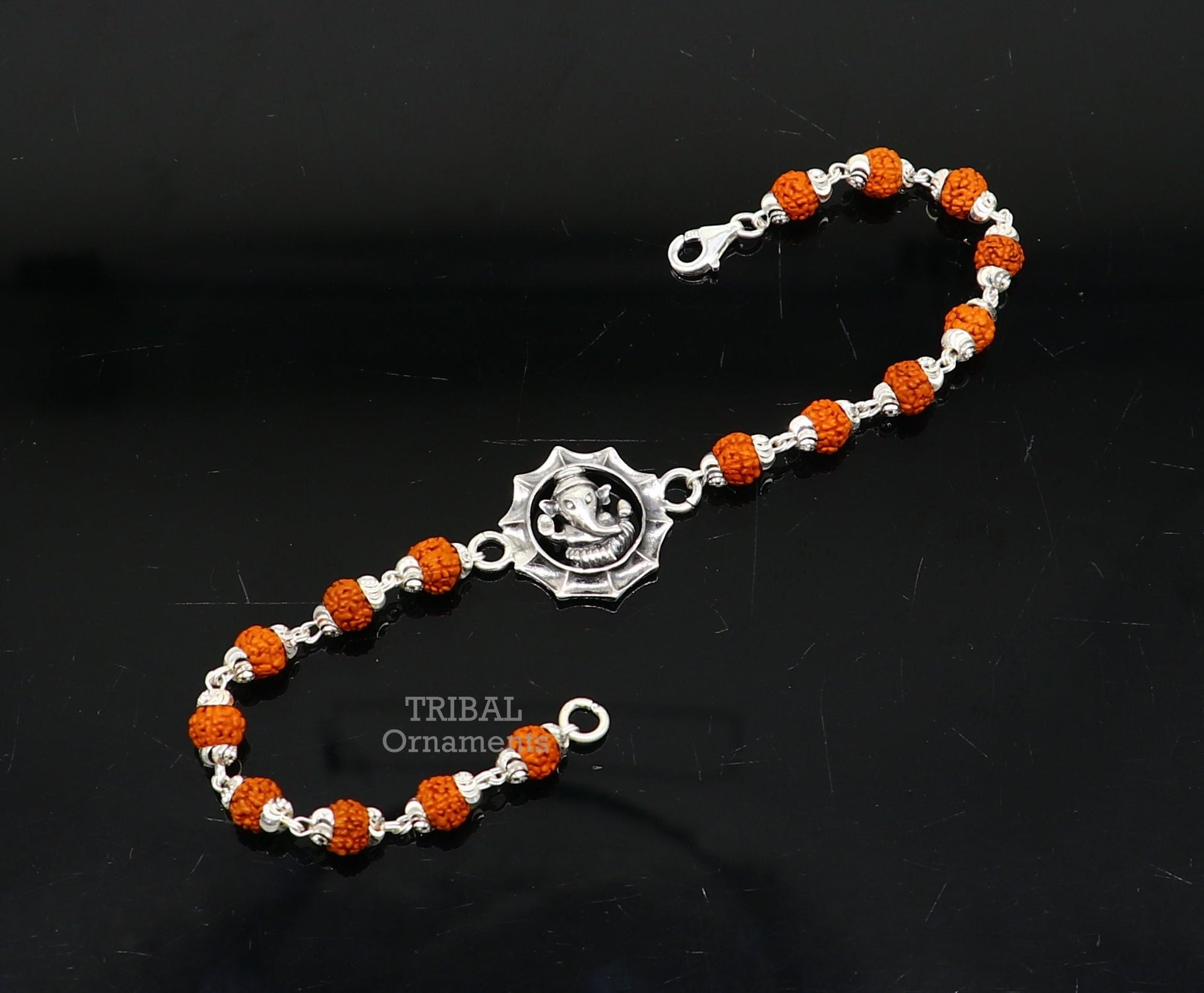 925 sterling silver Lord Ganesha design bracelet with Rudraksha and Tulsi beads, handmade by TRIBAL ORNAMENTS.