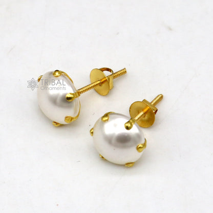 Unisex 14kt yellow gold stud earring with a round pearl by Tribal Ornaments, showcasing elegant Indian jewelry design.